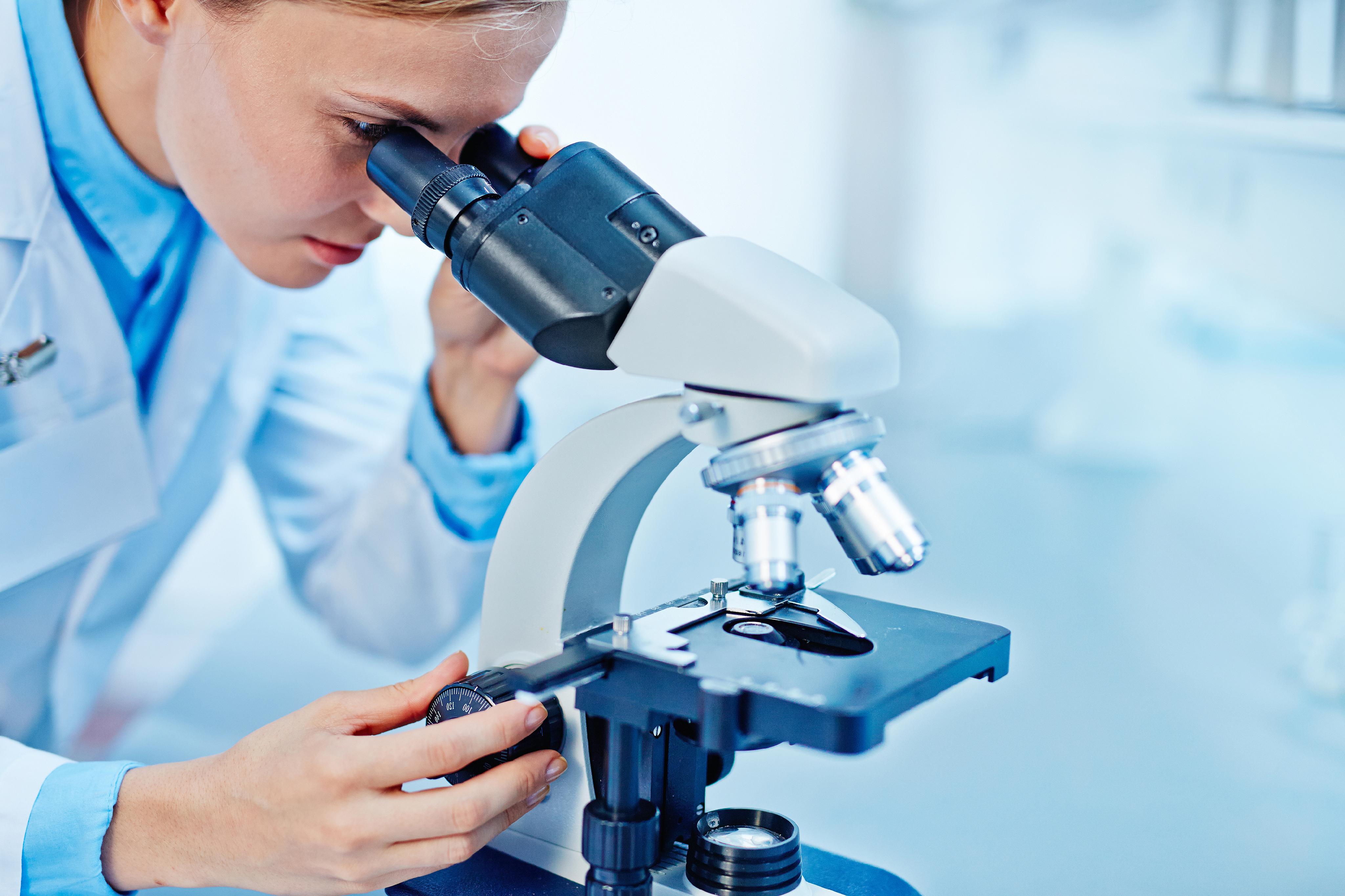 Medical laboratory professional analyzing samples